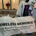 Banner and puppet carried Over 300 souls were honored at the 37th Annual Minnesota Homeless Memorial March and Service